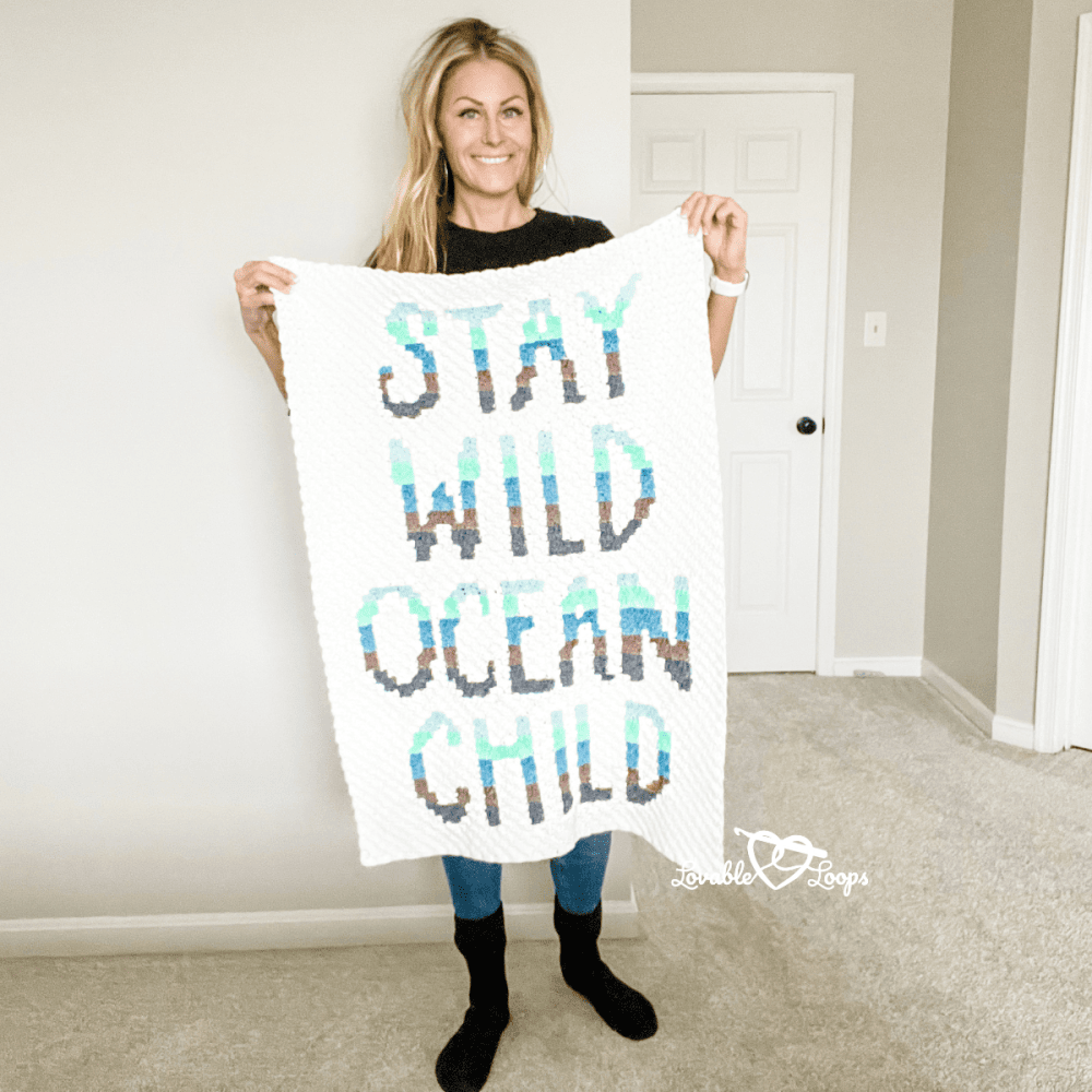 Free crochet baby blanket pattern "Stay Wild Ocean Child"; an easy yet advanced ocean-themed c2c blanket for boys and girls, includes charts and pictures.