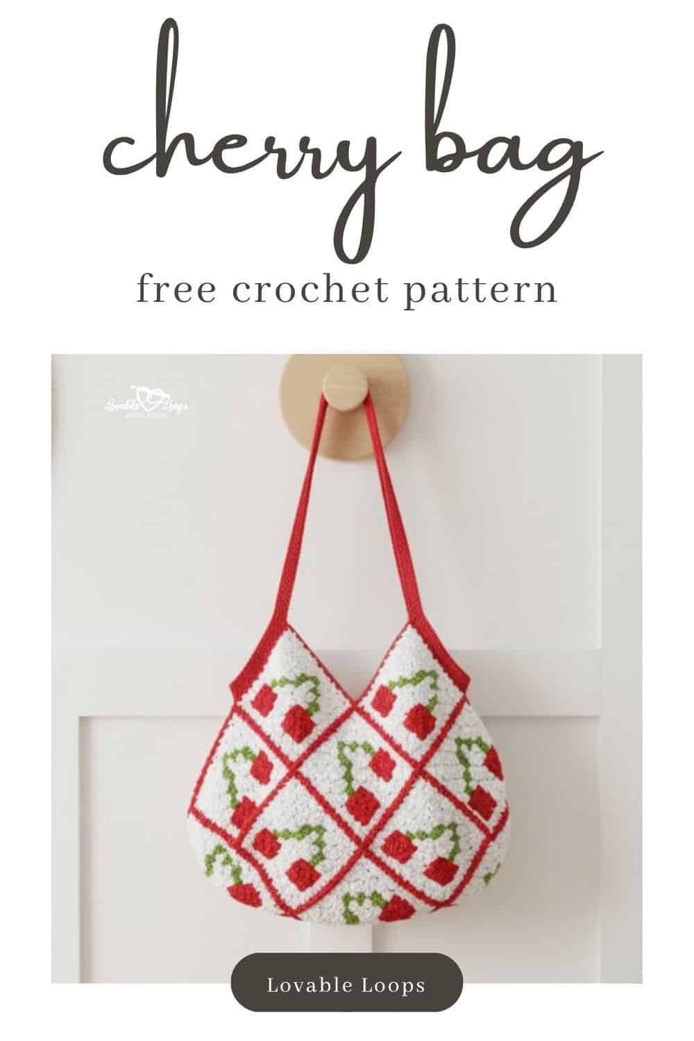Pinterest pin for a free crochet cherry bag pattern featuring a white crochet bag with red cherry motifs, green stems, and red straps hanging on a neutral wall.