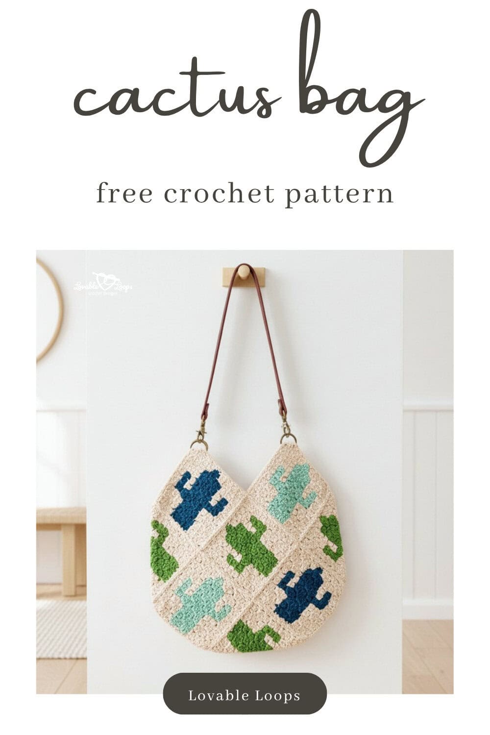 Pinterest pin for a free crochet cactus bag pattern featuring a cream tote with blue, mint, and green cactus motifs and brown straps hanging on a neutral wall.