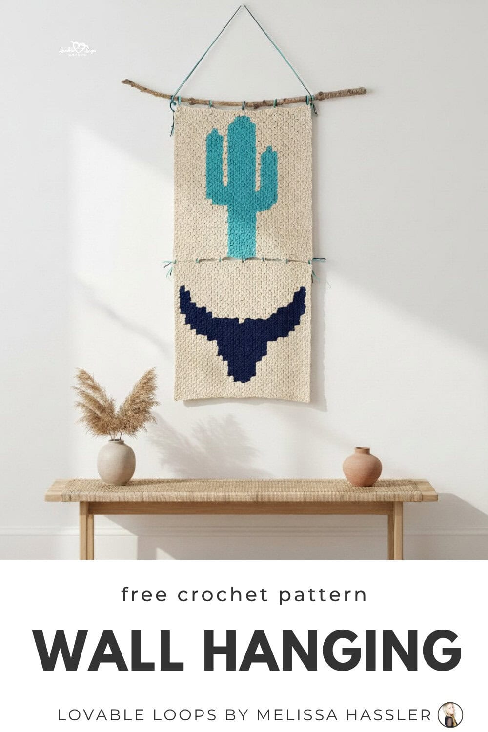 Crochet southwestern wall hanging with a large cactus design on a cream background, displayed on a white wall with a clean modern boho look.