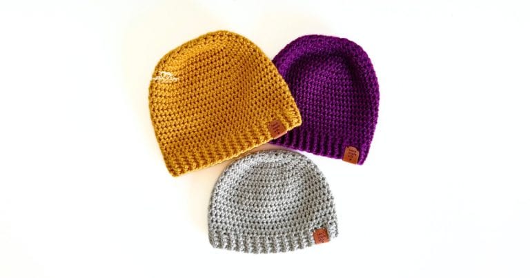 Three crochet beanies in mustard yellow, plum, and gray arranged in a triangle on a white background. Free easy crochet beanie pattern for beginners.