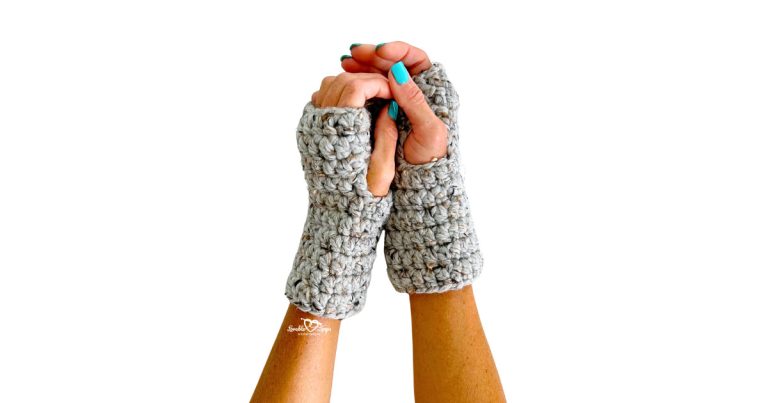 Front view of crocheted fingerless gloves in gray super bulky yarn. An easy and fast crochet pattern designed for beginners who want to make cozy hand warmers.