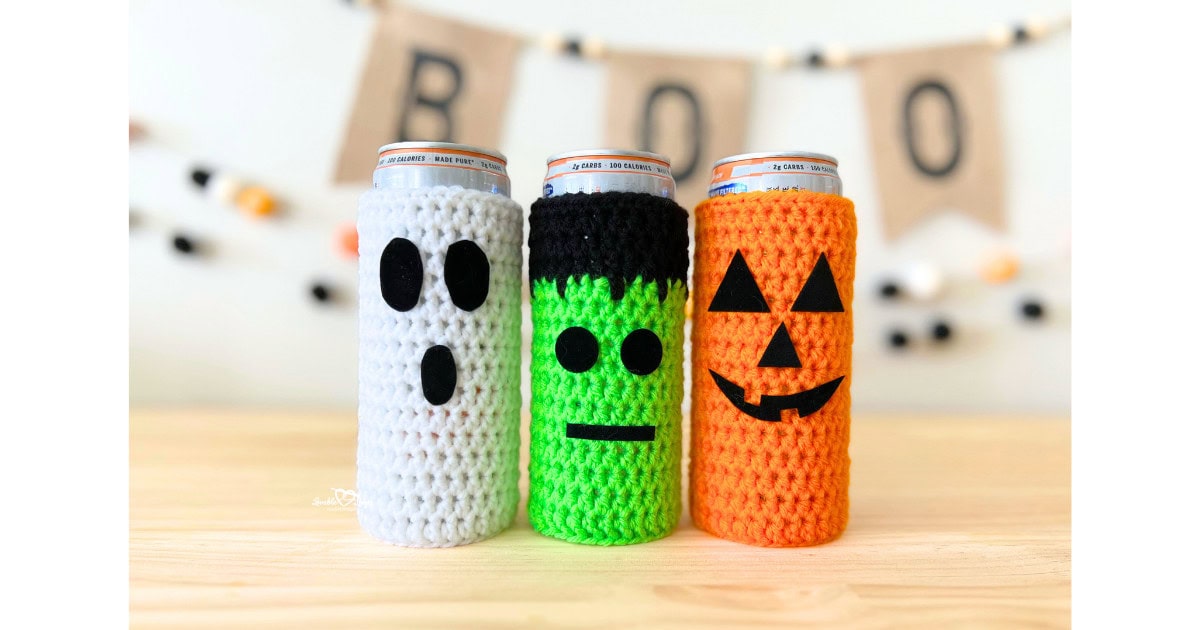 Set of three slim can cozies made with a free crochet can cozy pattern. Designs include a white ghost, green Frankenstein with black felt hair, and an orange jack-o’-lantern with a smiling face. Easy Halloween crochet koozie pattern for beginners.