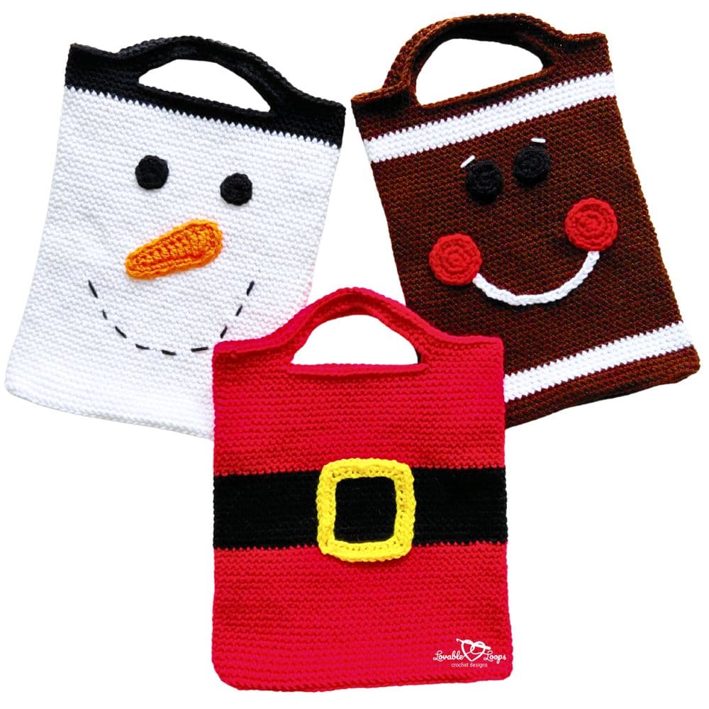 Three finished crochet Christmas bags displayed together: a white snowman with a carrot nose, a brown gingerbread man with red cheeks, and a red Santa bag with a yellow buckle.