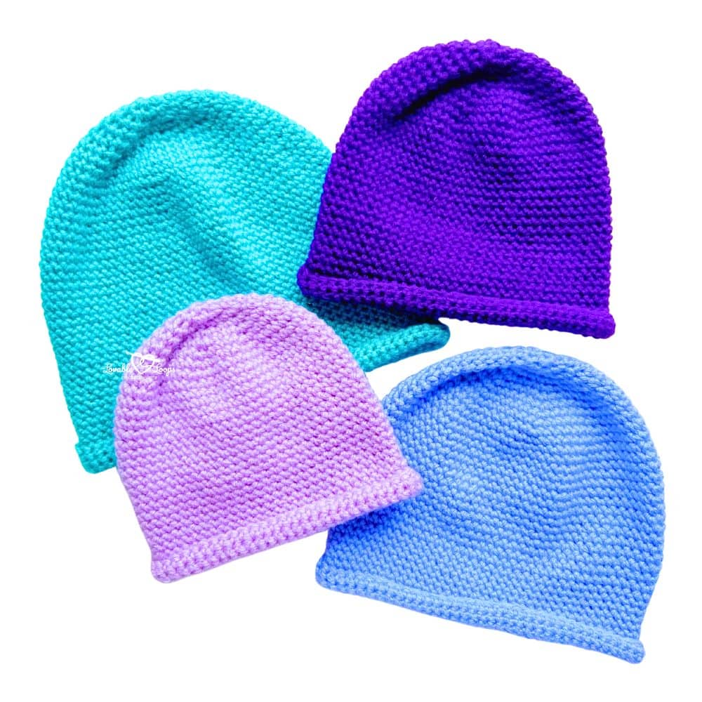 Four single crochet beanies in teal, purple, lavender, and blue yarn arranged in a cluster, showing the simple rolled brim design from a free single crochet beanie pattern in multiple sizes.