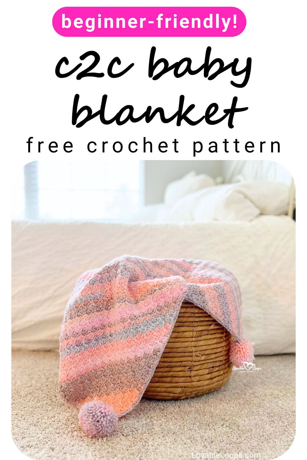 Beginner-friendly C2C baby blanket crochet pattern made with bulky yarn, shown folded over a basket in soft pink and gray stripes