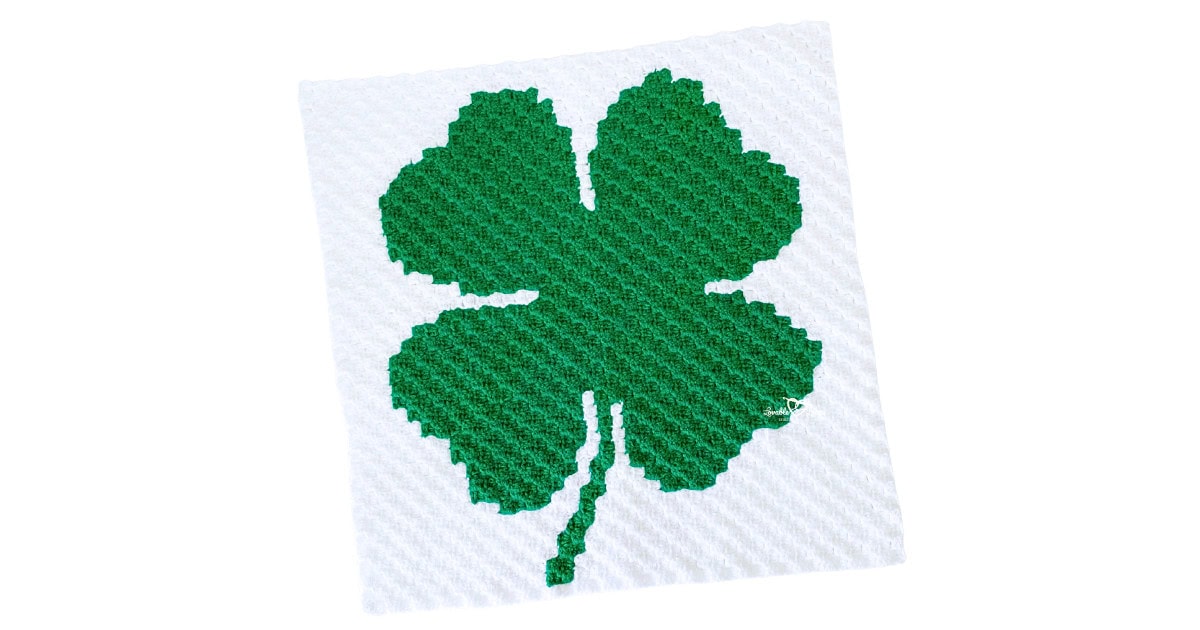 Green shamrock C2C shamrock crochet pattern panel worked in corner-to-corner on a white background, 40&times;40 blocks measuring 22 inches square.