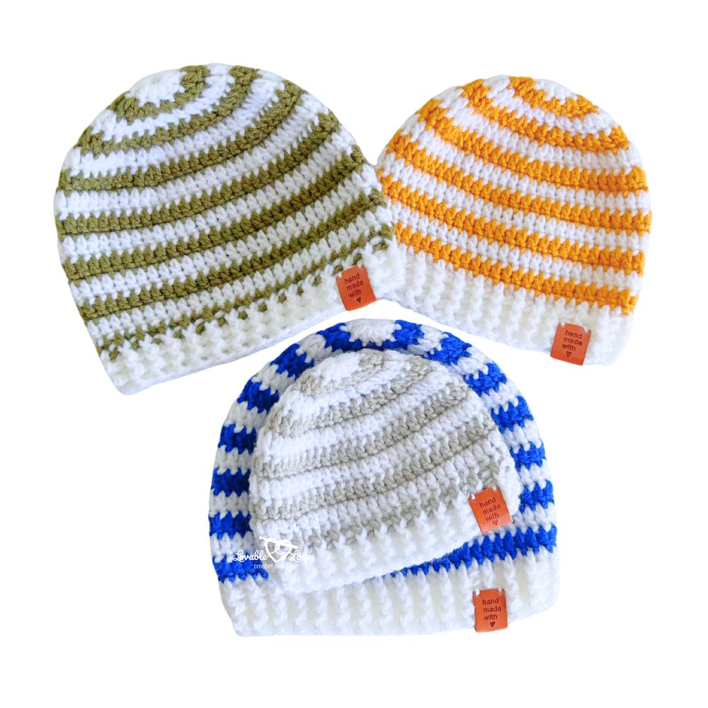 four handmade crochet beanie hats showing striped color variations, ribbed brims, and a classic top-down fit
