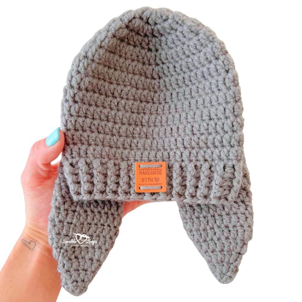 Gray crochet bunny hat with long floppy ears, made using a beginner-friendly crochet bunny hat pattern