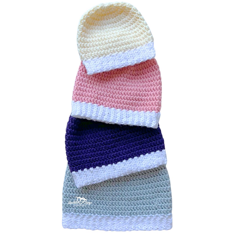 How to crochet a beanie in four sizes shown stacked—baby, toddler, child, and adult