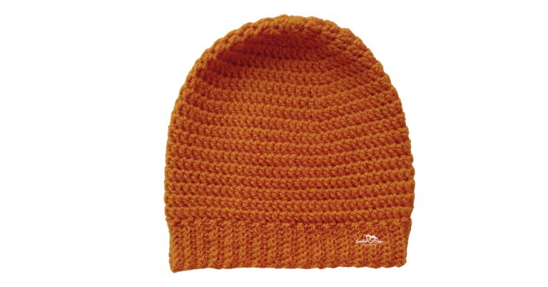 Burnt orange men&rsquo;s crochet hat with ribbed brim, worked top down in the round using double crochet stitches.
