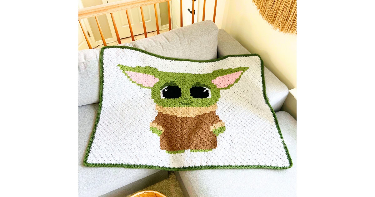 Finished Baby Yoda crochet blanket made using the C2C technique, perfect for a themed baby gift or nursery blanket