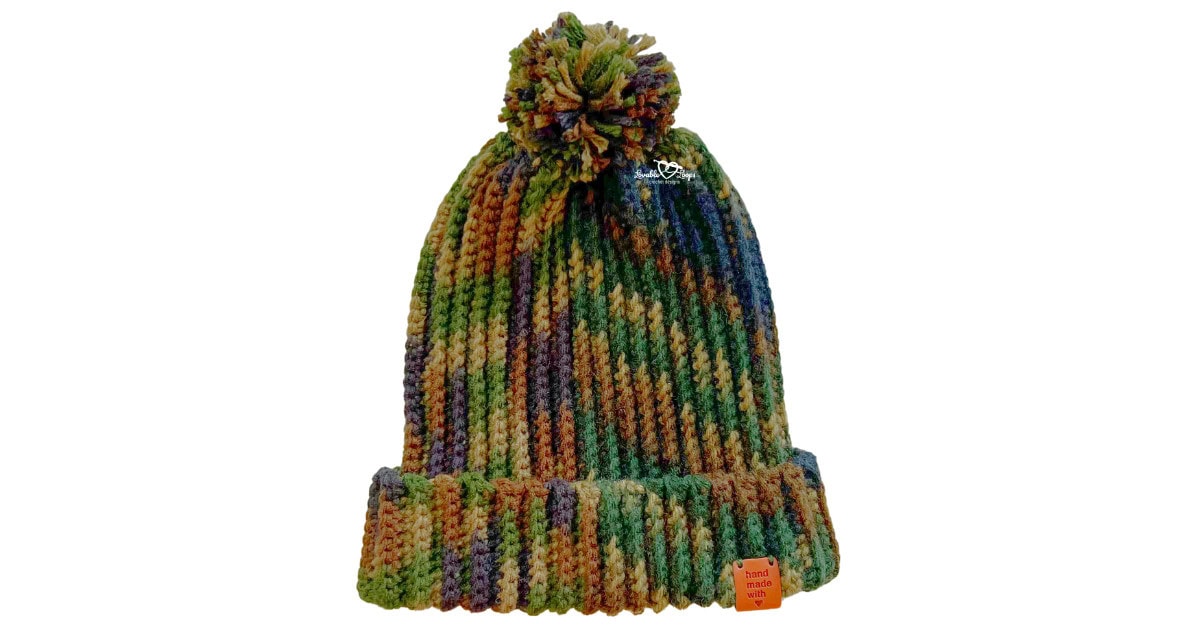 Classic crochet hat for men with stretchy ribbed texture, folded brim, and pom pom, worked flat in rows using back loop single crochet stitches.