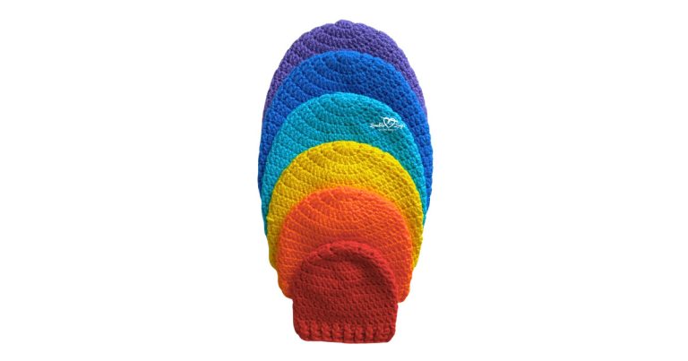 Easy crochet hat pattern worked in the round from the top down, displayed in baby through adult sizes with a clean, classic beanie shape