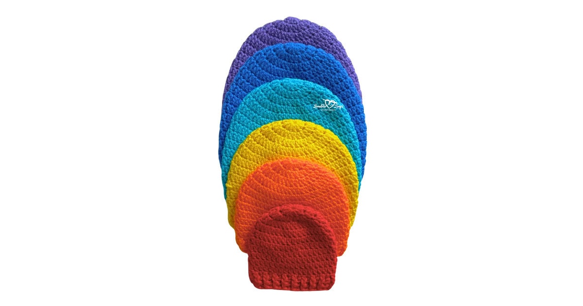 Easy crochet hat pattern worked in the round from the top down, displayed in baby through adult sizes with a clean, classic beanie shape