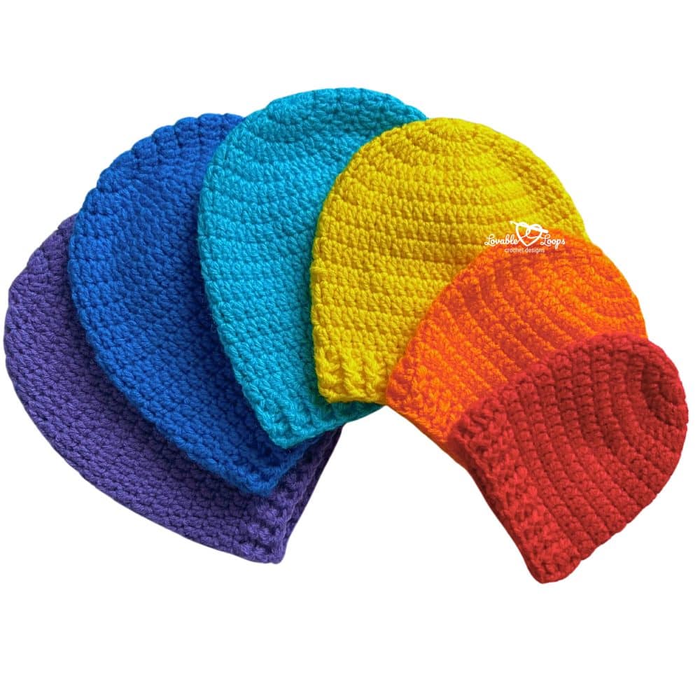 Easy crochet hat pattern featuring a classic top-down beanie with a ribbed brim, shown in multiple colors and sizes from baby to adult