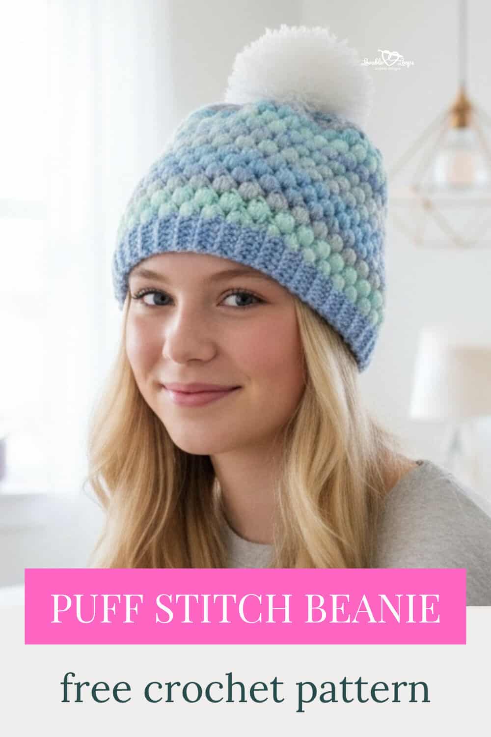 Teen girl wearing a blue, mint, and gray puff stitch crochet beanie with a white pom pom, with text that says &ldquo;Puff stitch beanie&rdquo; and &ldquo;free crochet pattern.&rdquo;