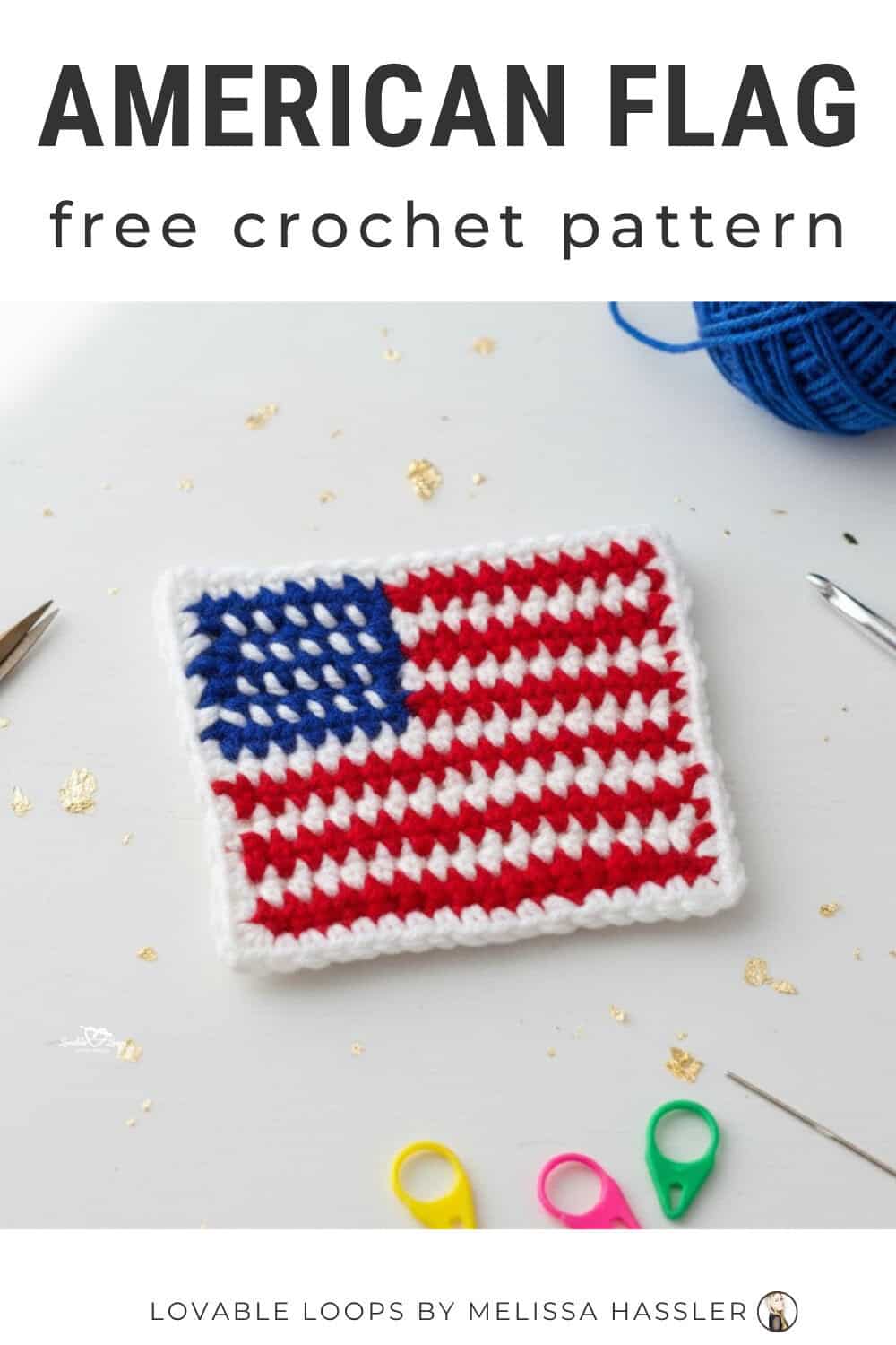 American flag crochet pattern displayed on a bright white desktop with a red, white, and blue crochet flag and simple craft tools around it.