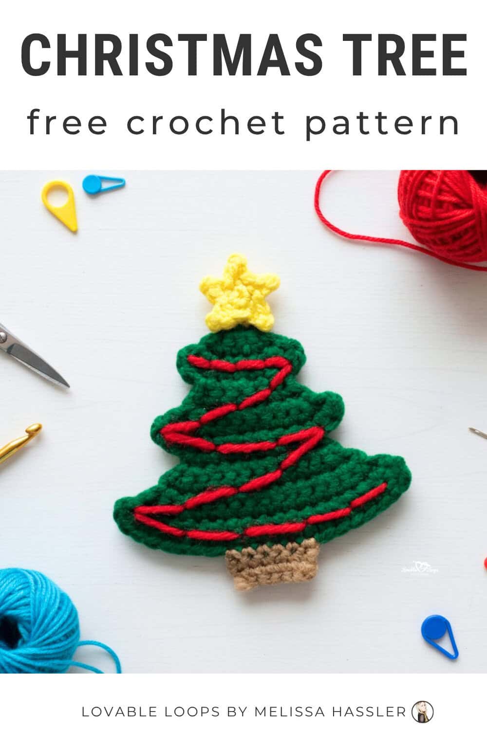Christmas tree crochet pattern displayed on a bright white desktop with a green crochet tree applique, red garland, yellow star, and simple craft tools around it.