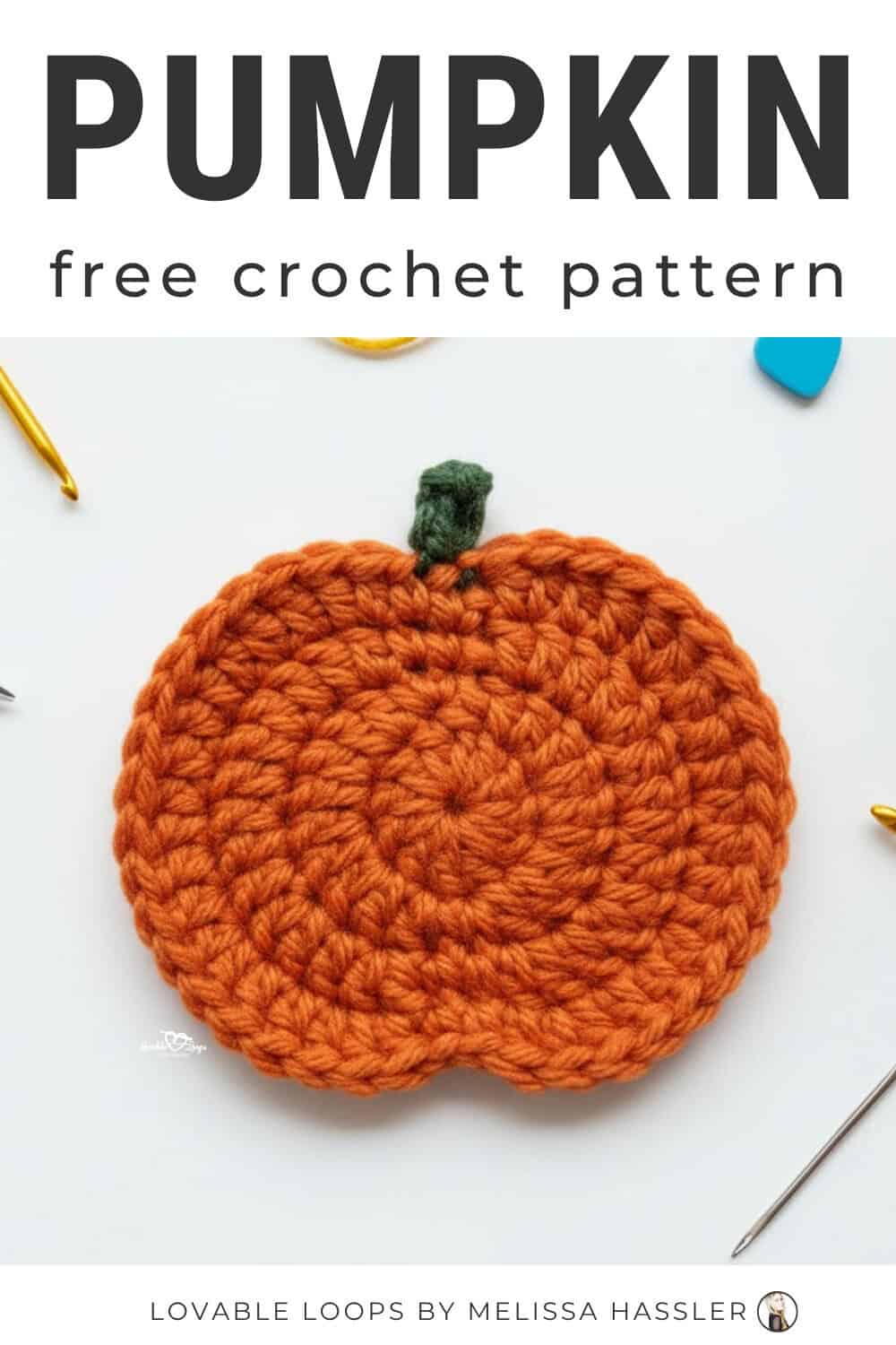 Pumpkin crochet pattern displayed on a bright white desktop with an orange crochet pumpkin applique and simple craft tools around it.