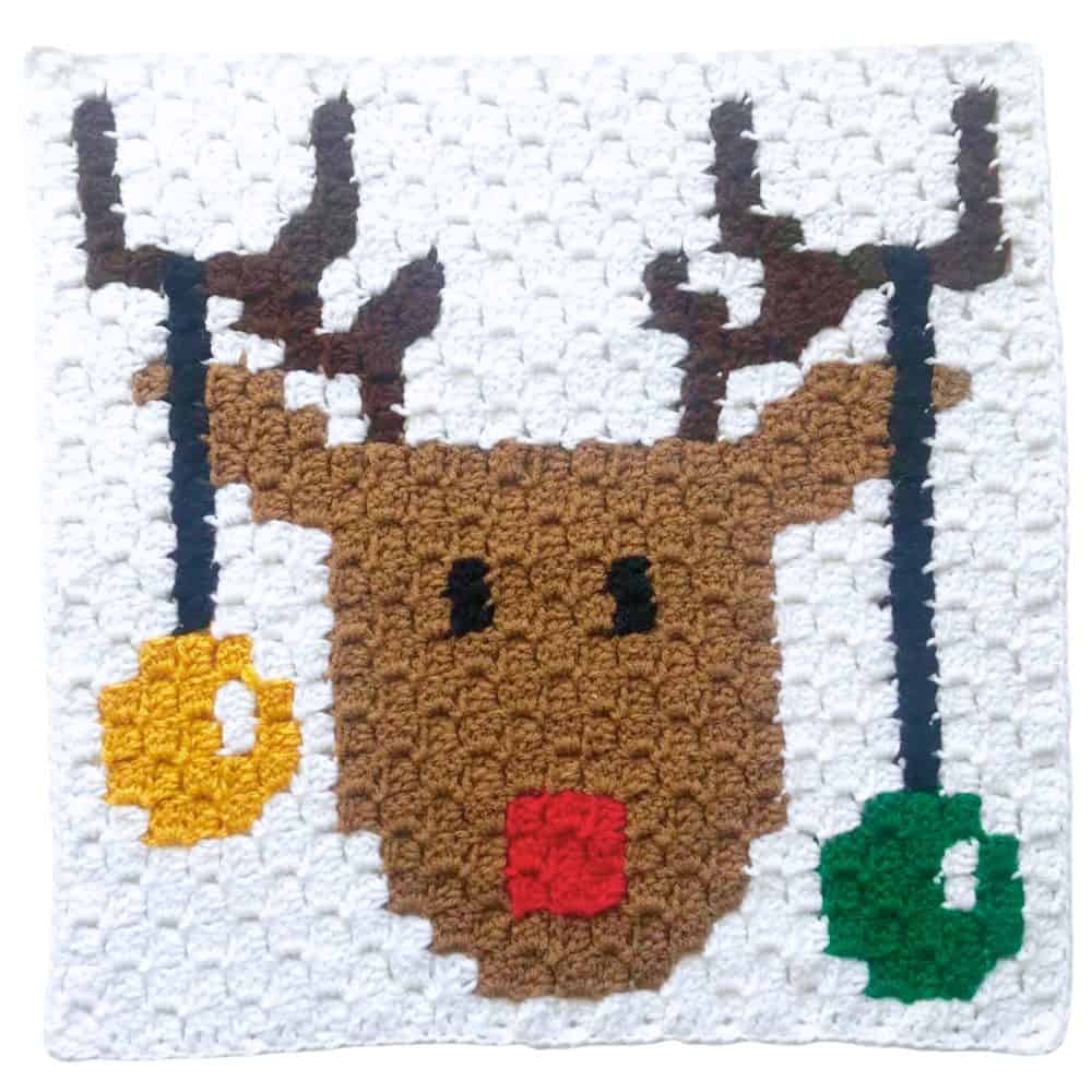 Finished C2C crochet reindeer square featuring a festive Christmas reindeer design.